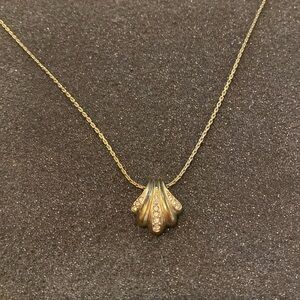 Christian Dior gold tone swish/shell necklace with rhinestones